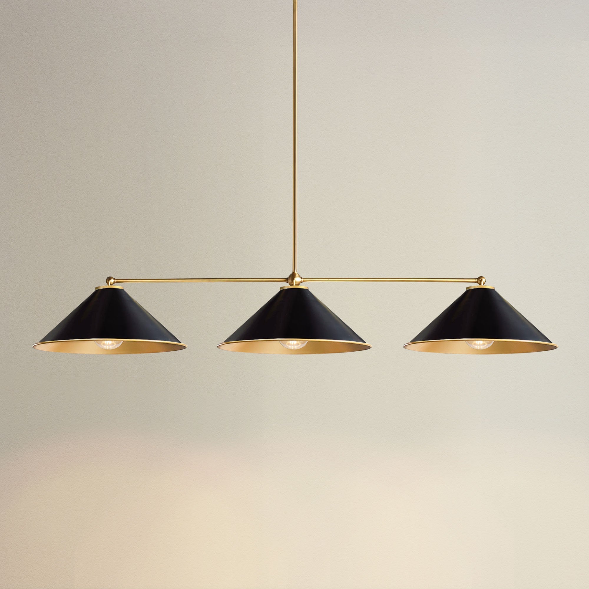 calista three light pendant with three black lampshades, on