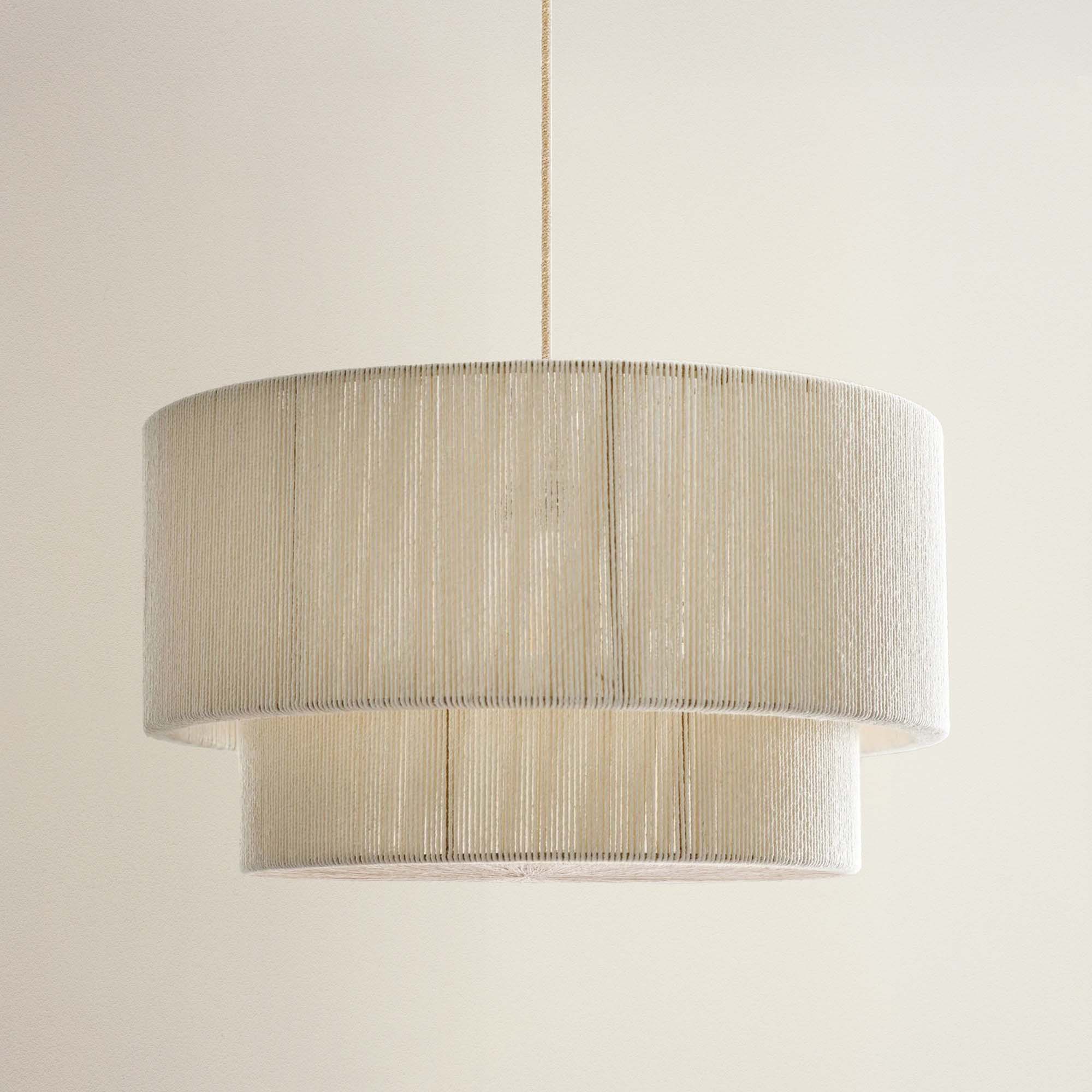 elaine rattan rendant light beige with a textured shade, off
