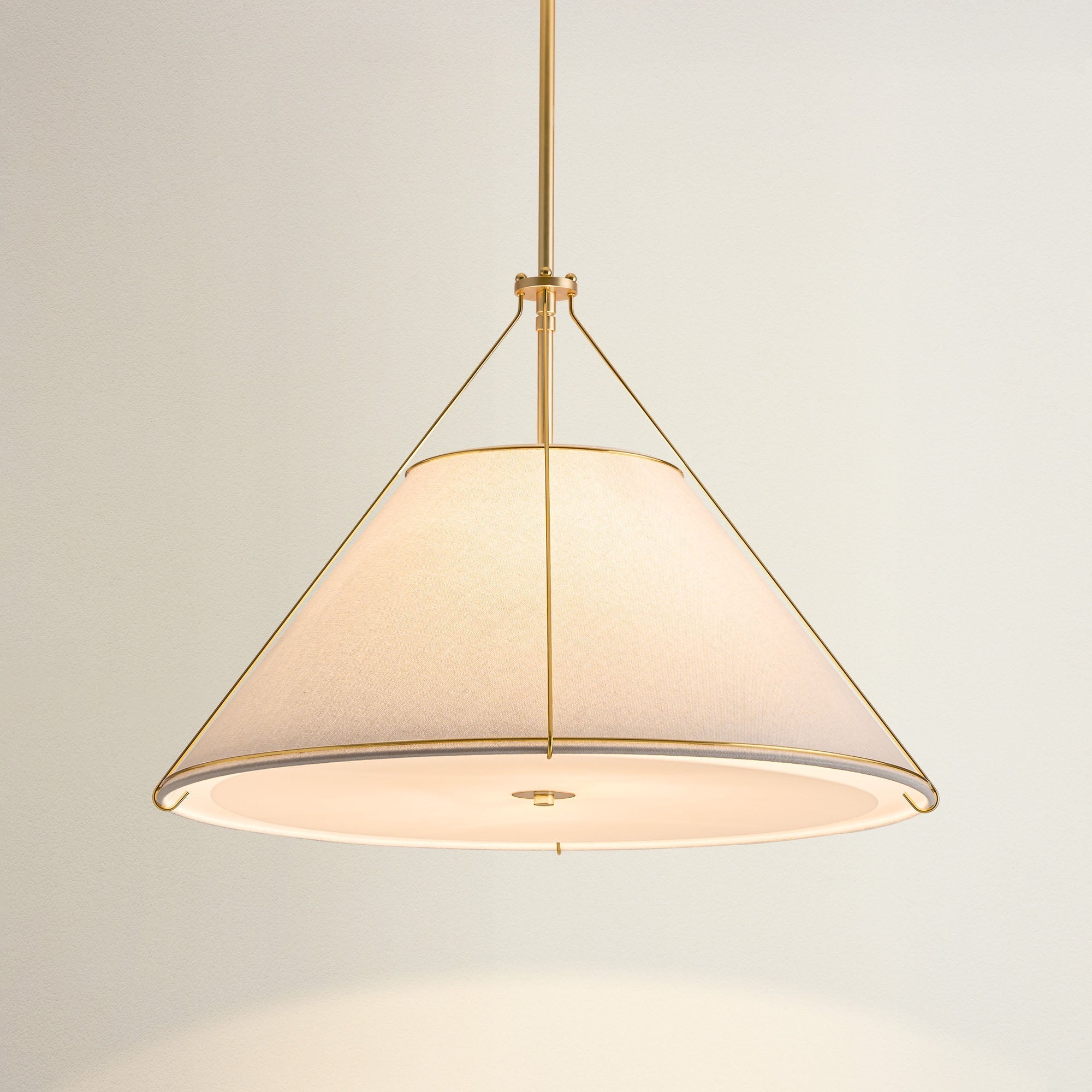 lumina cradle pendant light with gold frame and white shade, on