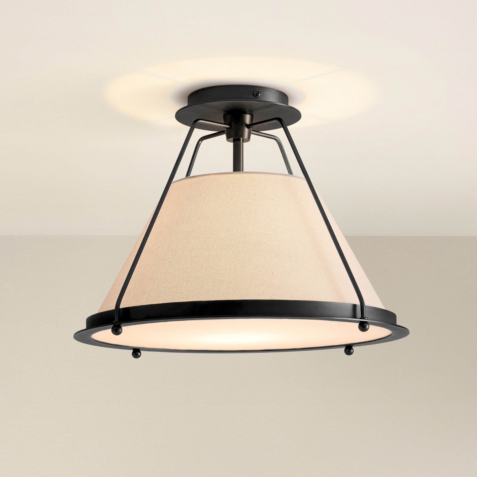 solacer flush mount ceiling light fixture with beige lampshade and black metal frame, on