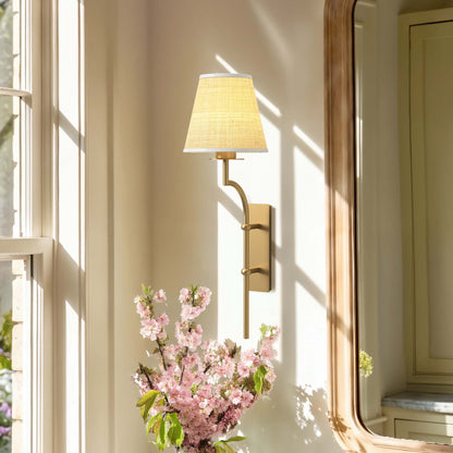 arco handwoven sconce bathroom with a soft glow next to a window and a mirror on a wall