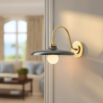 arcoris metal sconce for hallway with black shade and gold arm