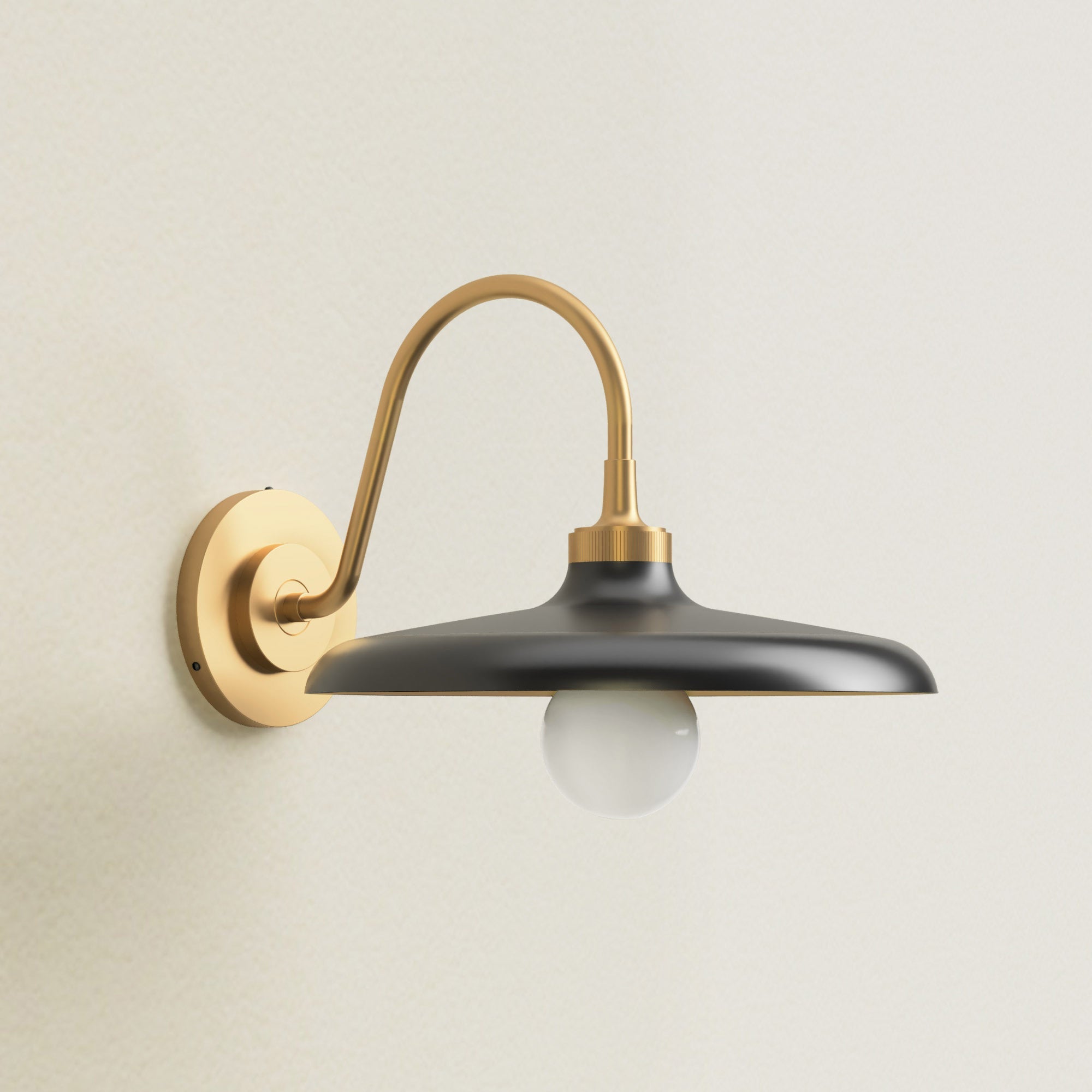 arcoris metal sconce light fixture with black shade and gold arm, off