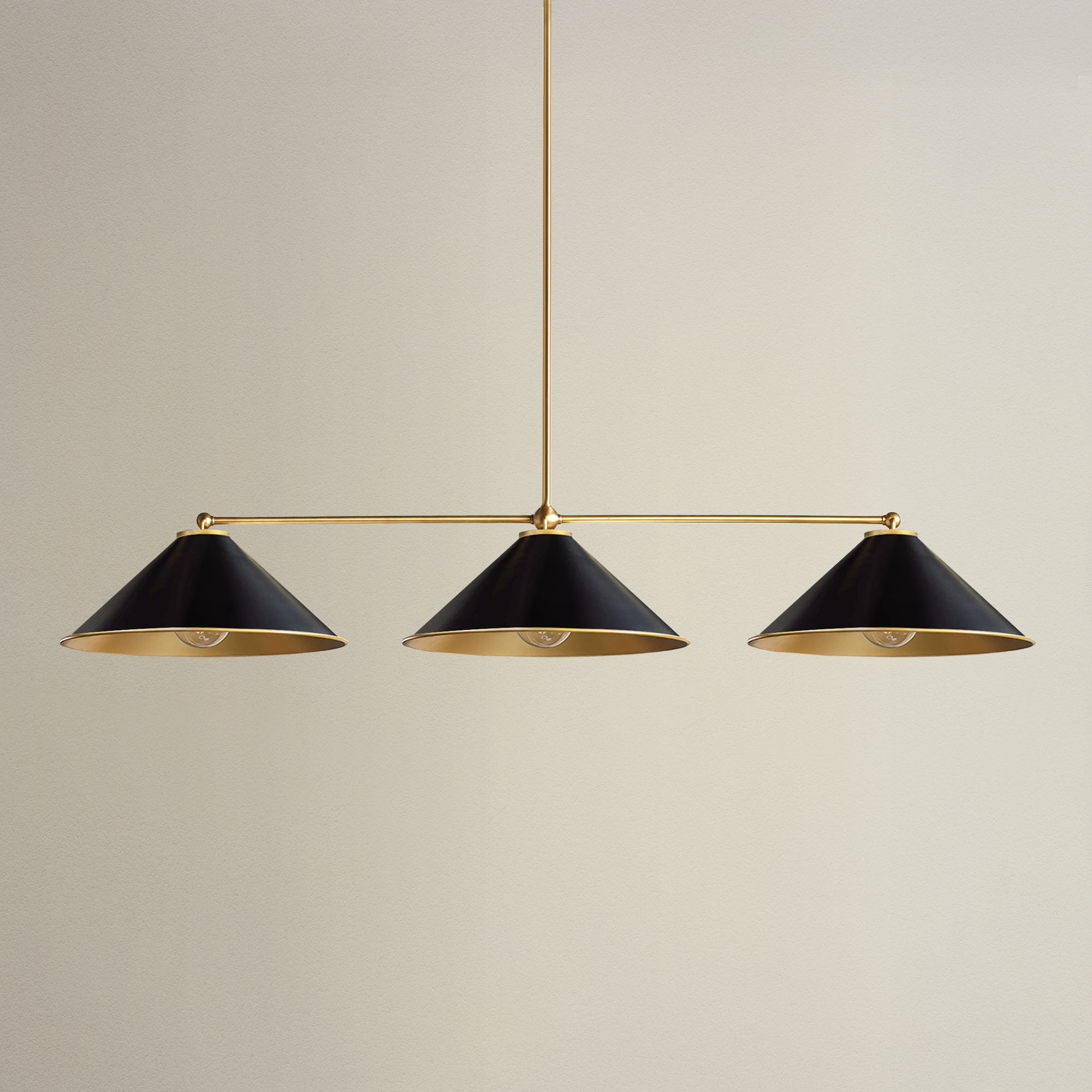 calista three light pendant with three black lampshades and gold accents, off
