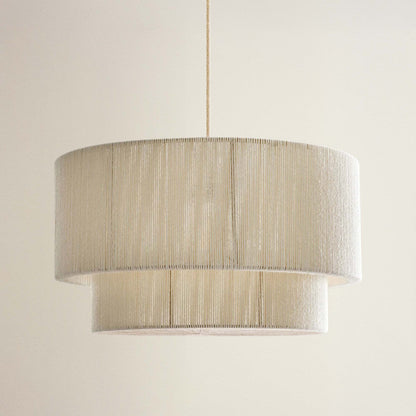 elaine rattan rendant light beige with a textured shade, off