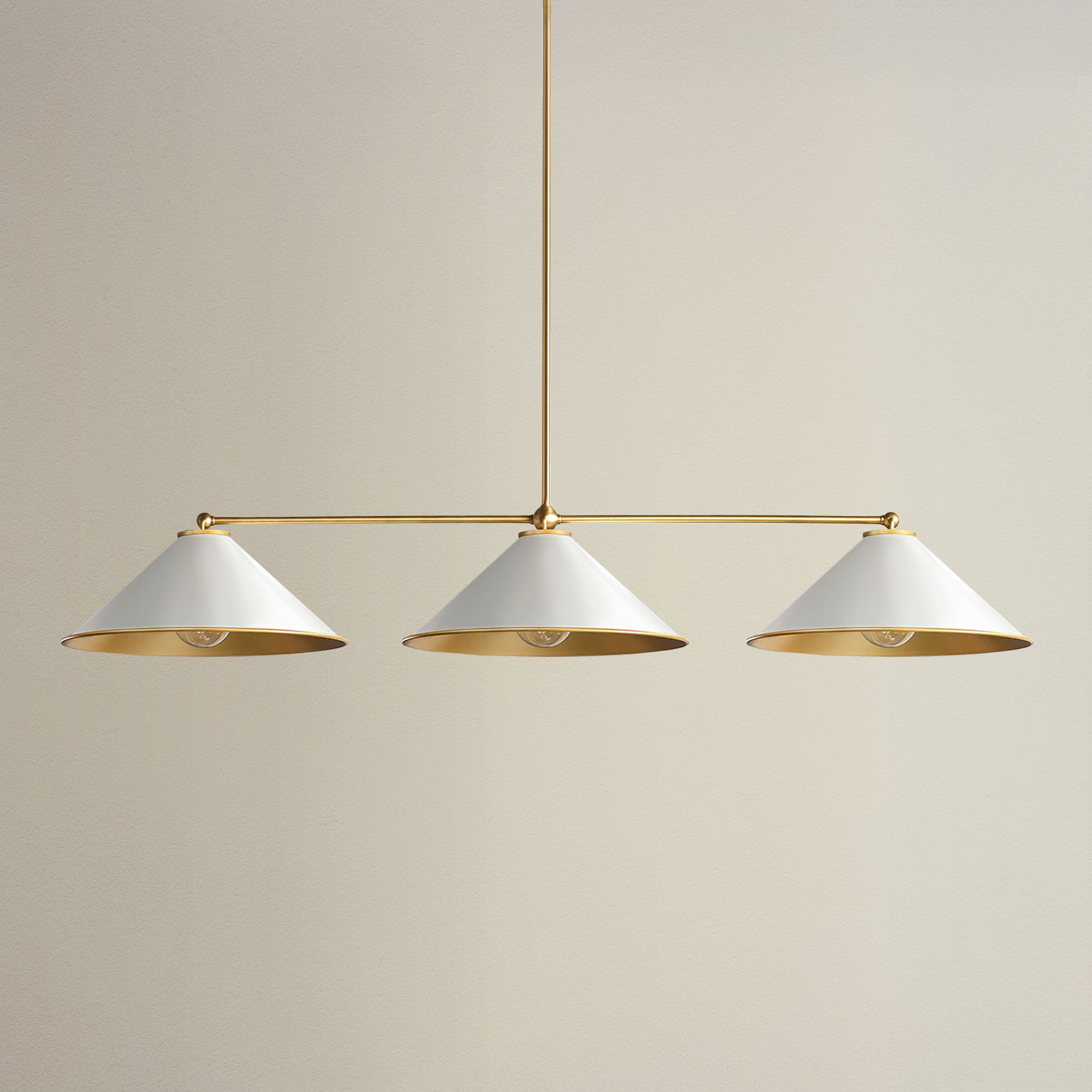liora three light pendant with three white lampshades and gold accents, off