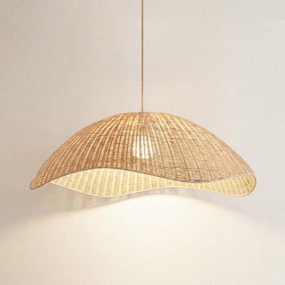 nana vermiculae woven rattan light hanging against on
