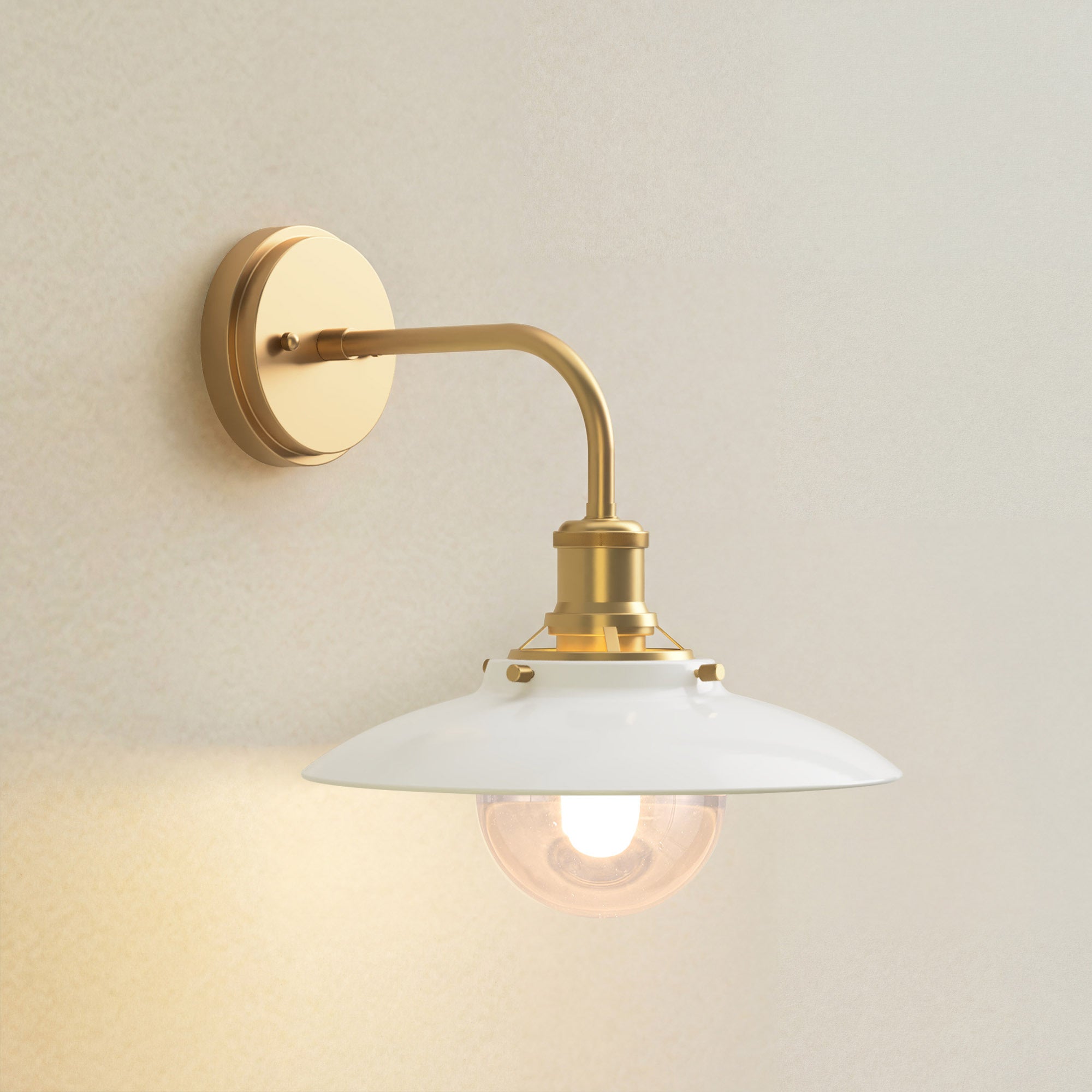 rowabi lanesra sconce gold with a white shade, on