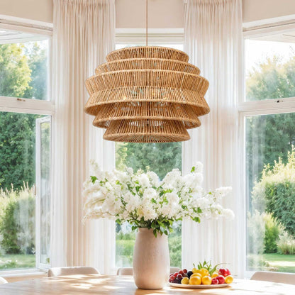 rowabi veronica rattan pandent light hanging above a table with flowers and fruit